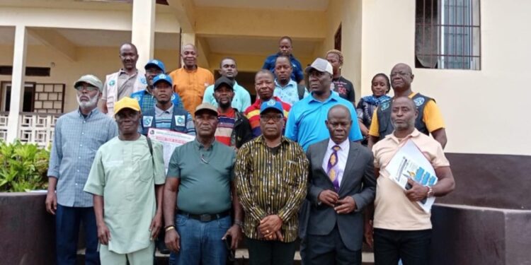 Liberia Land Authority officials and Maryland County leaders pose after a stakeholder meeting on customary land rights and governance in Harper.