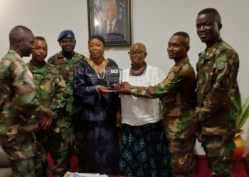 Liberian Ambassador Musu Yartu Ruhle and officials pose with Armed Forces of Liberia music graduates during a recognition ceremony in Accra, Ghana.