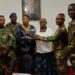 Liberian Ambassador Musu Yartu Ruhle and officials pose with Armed Forces of Liberia music graduates during a recognition ceremony in Accra, Ghana.