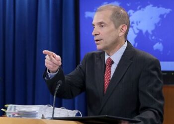 U.S. Ambassador addressing immigration concerns during a press briefing, calling for economic reforms in Liberia to curb visa overstays.