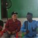 Community members and Vision Africa Mining representatives discuss proposed black sand project in Marshall City, Liberia