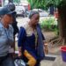 Mary Broh, escorted by security officers, arrives at court following her arrest in the Saudi rice corruption scandal after police breached protocol by raiding former President Ellen Johnson Sirleaf’s residence.