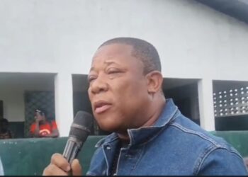 STAND Chairman Mulbah Morlu addressing a community in Monrovia as he rallies support for the July 17 nationwide protest against the Boakai administration.