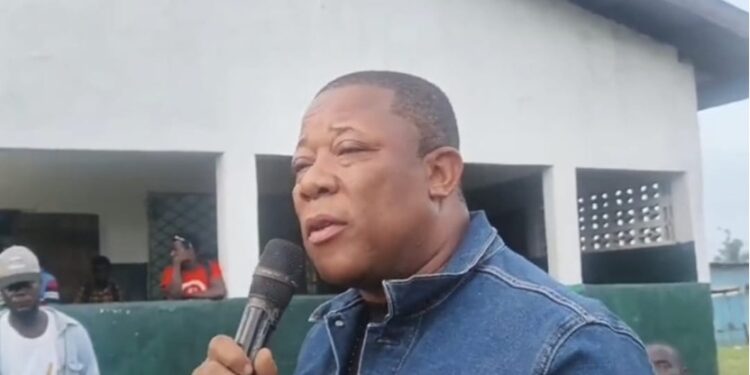 STAND Chairman Mulbah Morlu addressing a community in Monrovia as he rallies support for the July 17 nationwide protest against the Boakai administration.