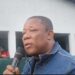 STAND Chairman Mulbah Morlu addressing a community in Monrovia as he rallies support for the July 17 nationwide protest against the Boakai administration.