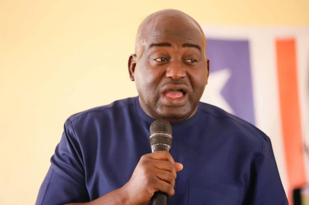 Rep. Musa Hassan Bility speaks into a microphone during a press appearance in Monrovia, calling for a Legislature audit and criticizing President Boakai over the Koffa arson trial.