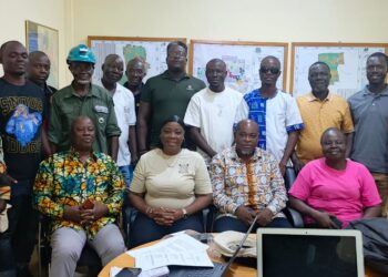 NBC officials and representatives from government institutions pose in Maryland County during a compliance review of MOPP and CRC concessions.