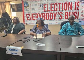 NEC Chairperson Davidetta Browne Lansanah flanked by election officials during a press briefing to announce the opening of nominations for the Nimba District 5 by-election at the NEC headquarters in Monrovia.