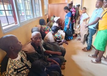 Citizens waiting in long lines at the National Identification Registry (NIR) enrollment center in Gbarnga, Bong County, Liberia