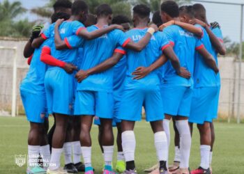Liberia U-20 national football team huddles together at George Weah Technical Center following news of WAFU Championship postponement