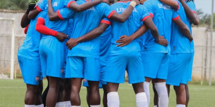Liberia U-20 national football team huddles together at George Weah Technical Center following news of WAFU Championship postponement