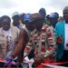 President Joseph Boakai and officials cut ribbon during the launch of the restored Fagonda Dam and $650,000 irrigation project in Wahansa, Lofa County