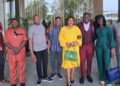 West African journalists, including Liberia’s Willie Tokpah, pose outside QNET’s Malaysian headquarters during a media familiarization tour aimed at combating misinformation.