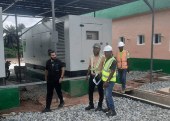 RREA engineers inspect hybrid power generation facility under construction in Bawala, Lower Lofa County
