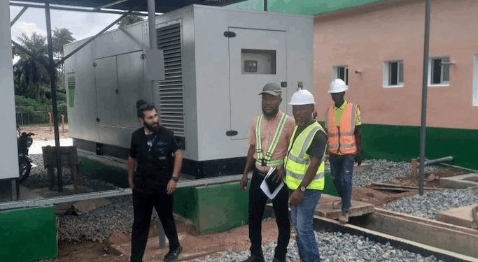 RREA engineers inspect hybrid power generation facility under construction in Bawala, Lower Lofa County