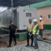 RREA engineers inspect hybrid power generation facility under construction in Bawala, Lower Lofa County