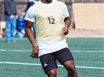 Liberian footballer Trokon Soclo poses in Med City FC jersey, hopeful for Lone Star call-up