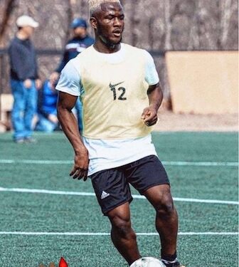 Liberian footballer Trokon Soclo poses in Med City FC jersey, hopeful for Lone Star call-up