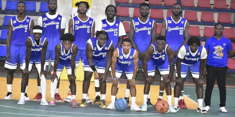 Spartacus Basketball Club poses after scoring a record 111 points in an LBA First Division match under the leadership of Coach Wellay T. Baar.