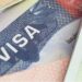 Close-up image of a U.S. visa page, symbolizing immigration policy and travel restrictions under new executive orders, as Liberia is exempted from the 2025 Trump visa ban.