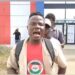University of Liberia student and SUP member shouts during protest at Liberia Football Association headquarters in Monrovia