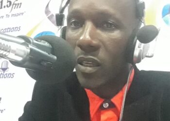 MCSS Teachers’ Association President Augustine N. Nyormui speaks during a radio interview amid rising criticism from volunteer teachers over unpaid salaries.