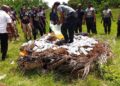 Liberian drug enforcement officers burn seized narcotics during World Anti-Drug Day along Roberts International Airport Highway