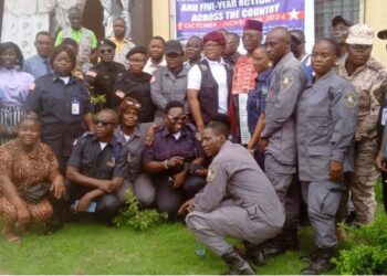 Group photo of Justice Ministry officials, security officers, and local leaders in Grand Gedeh County during the launch of the Gender Policy and Five-Year Action Plan at Tubman Palace.