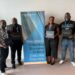 Four ArcelorMittal Liberia executives proudly display Columbia Business School certificates after completing the LEAD CONNECT High Impact Leadership Program