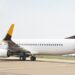 ASKY Airlines Boeing 737 aircraft taxiing on runway at Roberts International Airport in Liberia