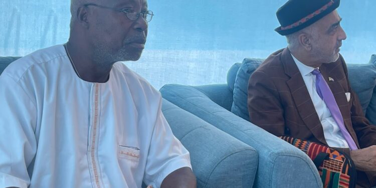 Prof. Alaric K. Tokpa and Dr. Aaron Weah attend a policy dialogue on establishing Liberia’s War and Economic Crimes Court in Monrovia.