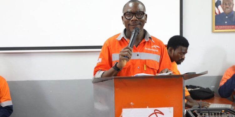 Amos T. Daywhea speaks during ArcelorMittal Liberia training academy enrollment ceremony in Yekepa