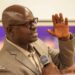 Deputy Sports Minister G. Andy Quamie speaks at CAF coaching course graduation, urging unity in Liberian football amid criticism of his past leadership role.