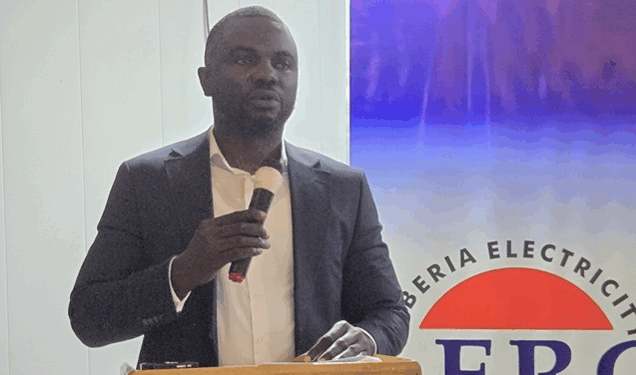 Atty. Kla-Edward Toomey II speaking at podium as Liberia ranks among top performers in AfDB’s 2024 Electricity Regulatory Index