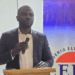 Atty. Kla-Edward Toomey II speaking at podium as Liberia ranks among top performers in AfDB’s 2024 Electricity Regulatory Index