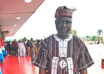 Cllr. Boakai Kanneh, nominee for Associate Justice of the Supreme Court of Liberia, pictured in traditional attire at an official event in Monrovia.