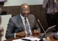 Executive Governor of the Central Bank of Liberia, Henry F. Saamoi, delivers the Monetary Policy Committee Communiqué at CBL headquarters in Monrovia, announcing the decision to maintain the interest rate at 17.25% amid Q2 economic growth and easing inflation.