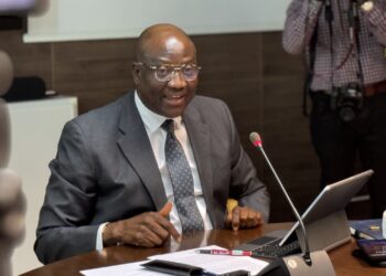 Executive Governor of the Central Bank of Liberia, Henry F. Saamoi, delivers the Monetary Policy Committee Communiqué at CBL headquarters in Monrovia, announcing the decision to maintain the interest rate at 17.25% amid Q2 economic growth and easing inflation.