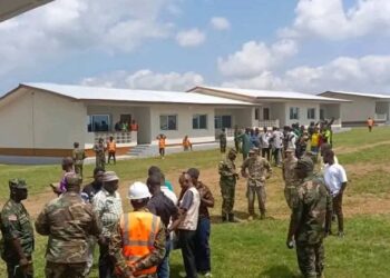 Liberian soldiers and officials inspect newly renovated Camp Grant Military Barracks in Sanniquillie, Nimba County ahead of dedication ceremony