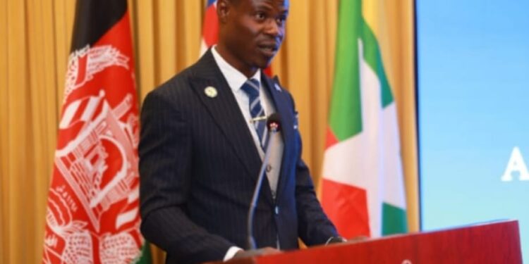 Assistant Mines Minister Carlos Eddison Tingban speaks at closing ceremony in China after completing mine safety training