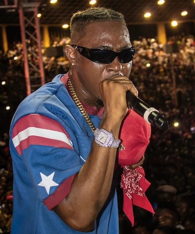 Christoph the Change performs live at a packed SKD Stadium, wearing a Liberian-flag-themed jersey during his historic Independence Day concert.