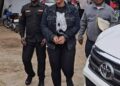 LDEA officers escort Liberian businesswoman Quita Dolo Kosso in handcuffs after her arrest for trafficking US$181K worth of cocaine from Bangkok at Roberts International Airport