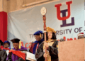 UL President Dr. Layli Maparyan leading academic procession at University of Liberia convocation with ceremonial mace