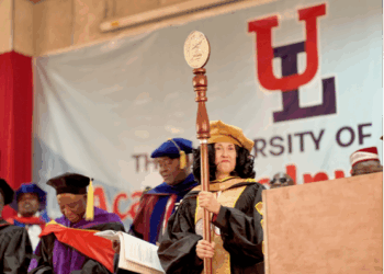 UL President Dr. Layli Maparyan leading academic procession at University of Liberia convocation with ceremonial mace