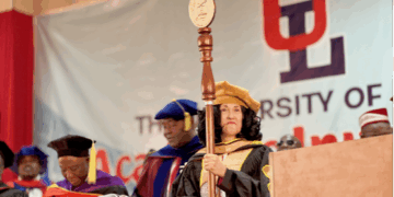 UL President Dr. Layli Maparyan leading academic procession at University of Liberia convocation with ceremonial mace