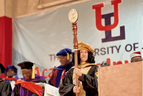 UL President Dr. Layli Maparyan leading academic procession at University of Liberia convocation with ceremonial mace