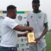 FC Fassell defender receives Man of the Match award at the Soccer for Peace Cup