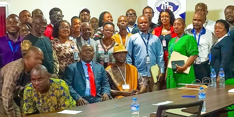 Group photo of Liberia’s Independent Information Commission staff and over 30 public officials during a Freedom of Information training session in Monrovia