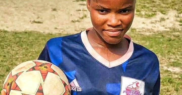 Gabrielle Lines, teenage striker and Republic FC captain, poses in her blue jersey holding a soccer ball before her tragic death