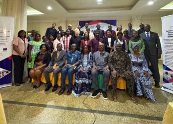 Group photo of ILO, ECOWAS officials, journalists, and partners at Abuja workshop on labor migration and decent work